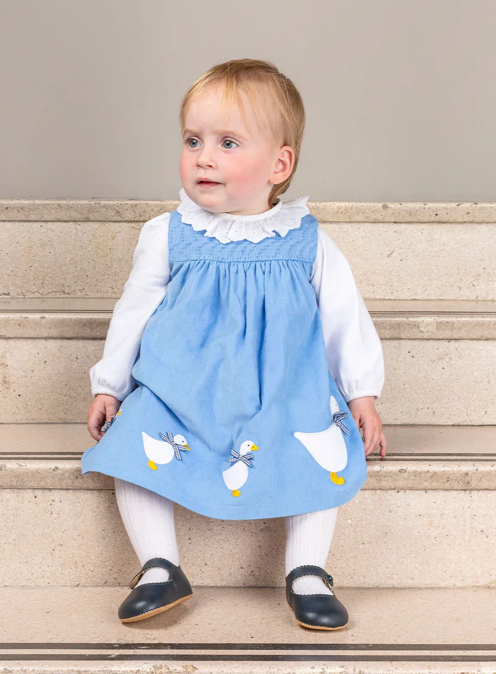 Baby Duck Smocked Pinafore in Blue Cord